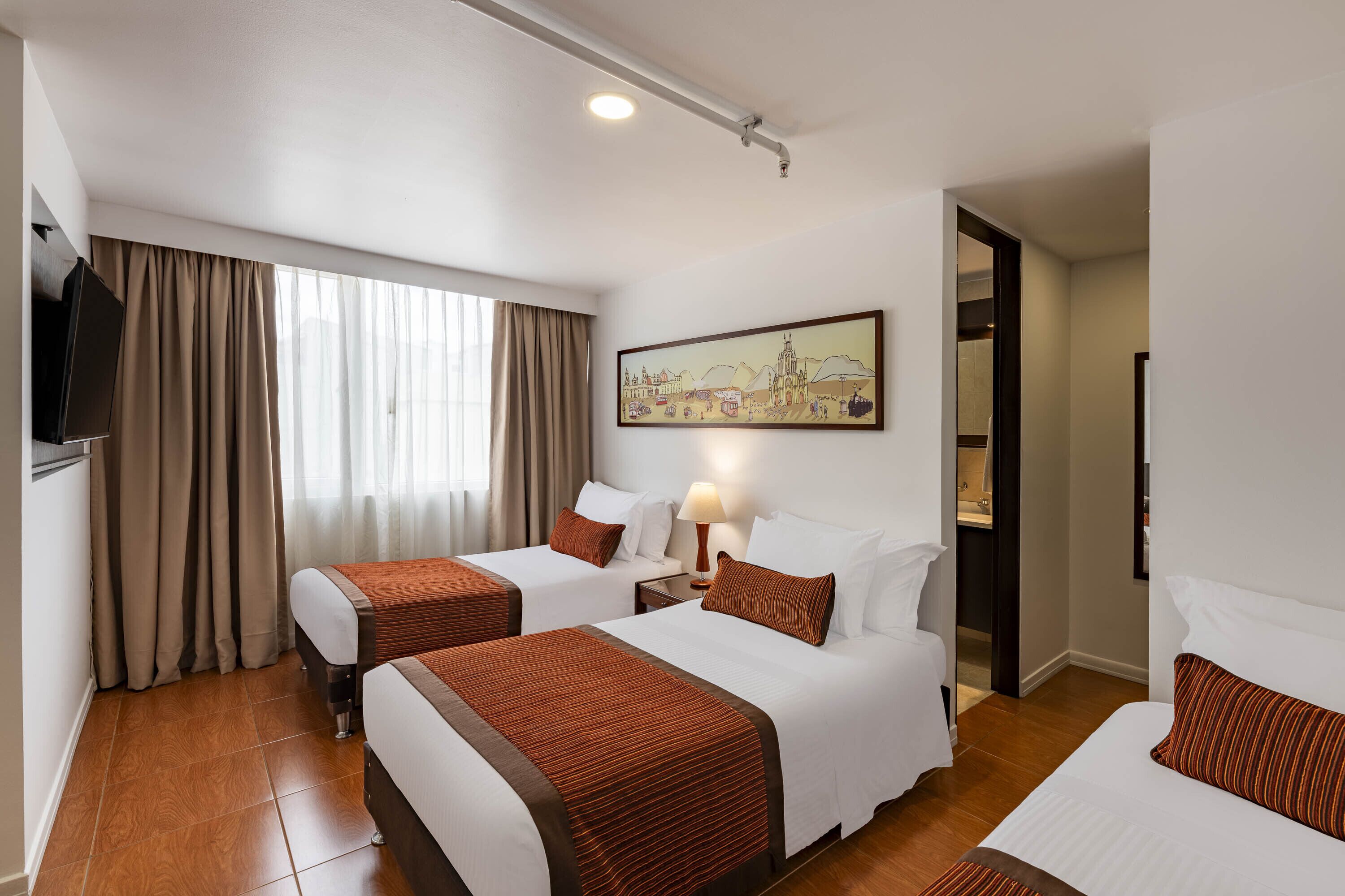 Kamar Standar | Seprai premium, selimut bulu angsa, minibar, dan brankas