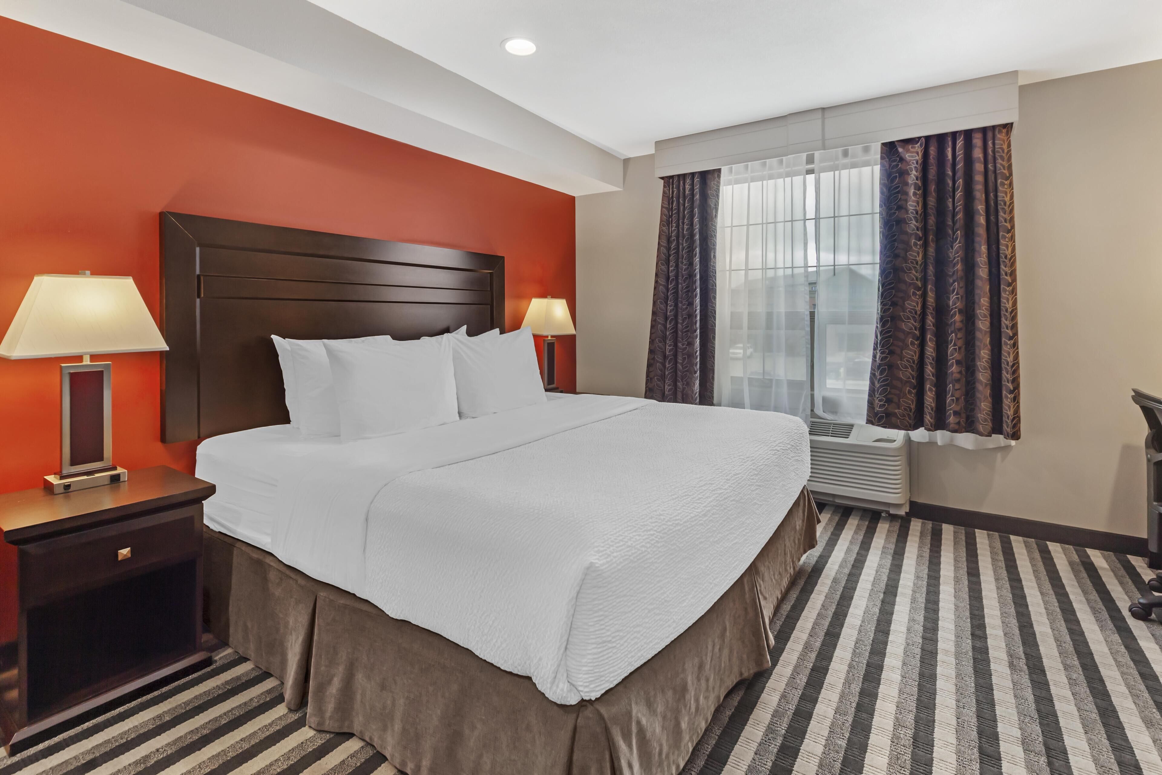 Premium bedding, pillowtop beds, desk, laptop workspace