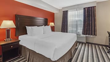 Premium bedding, pillowtop beds, desk, laptop workspace