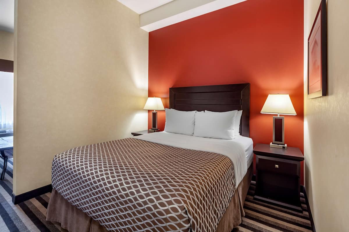Premium bedding, pillow-top beds, desk, laptop workspace