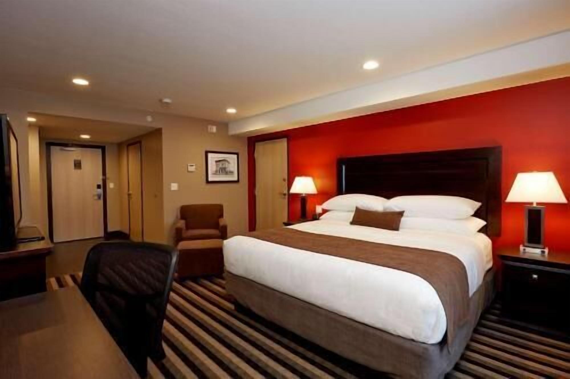 Premium bedding, pillow-top beds, desk, laptop workspace