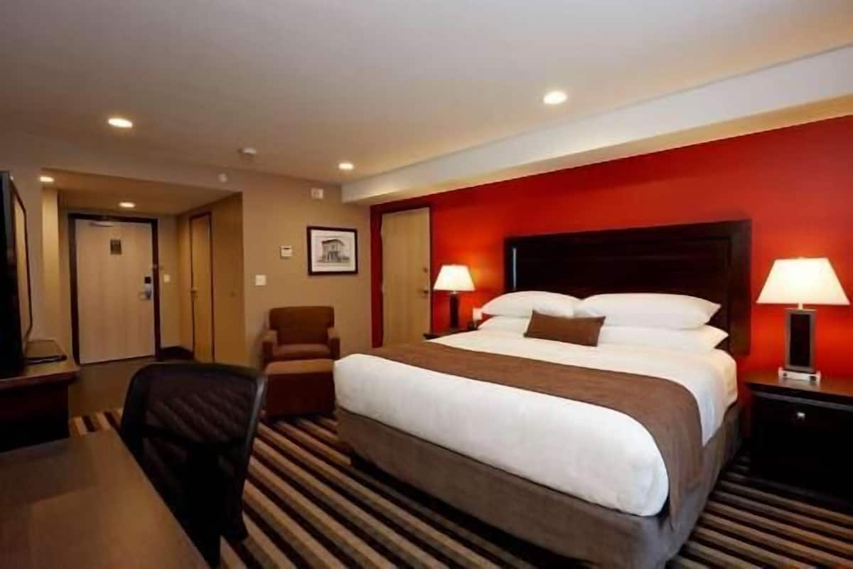 Premium bedding, pillow-top beds, desk, laptop workspace