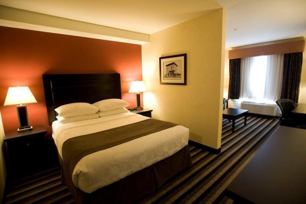 Premium bedding, pillow-top beds, desk, laptop workspace