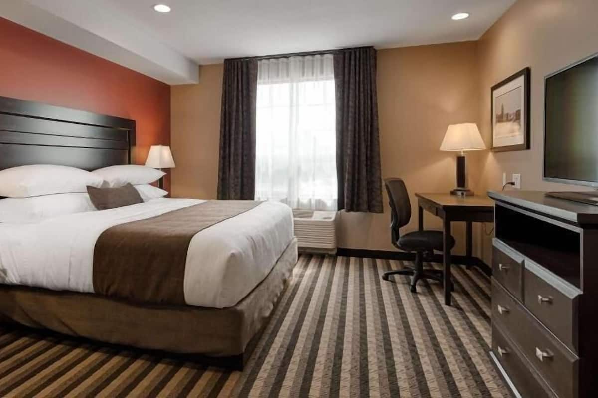 Premium bedding, pillow-top beds, desk, laptop workspace