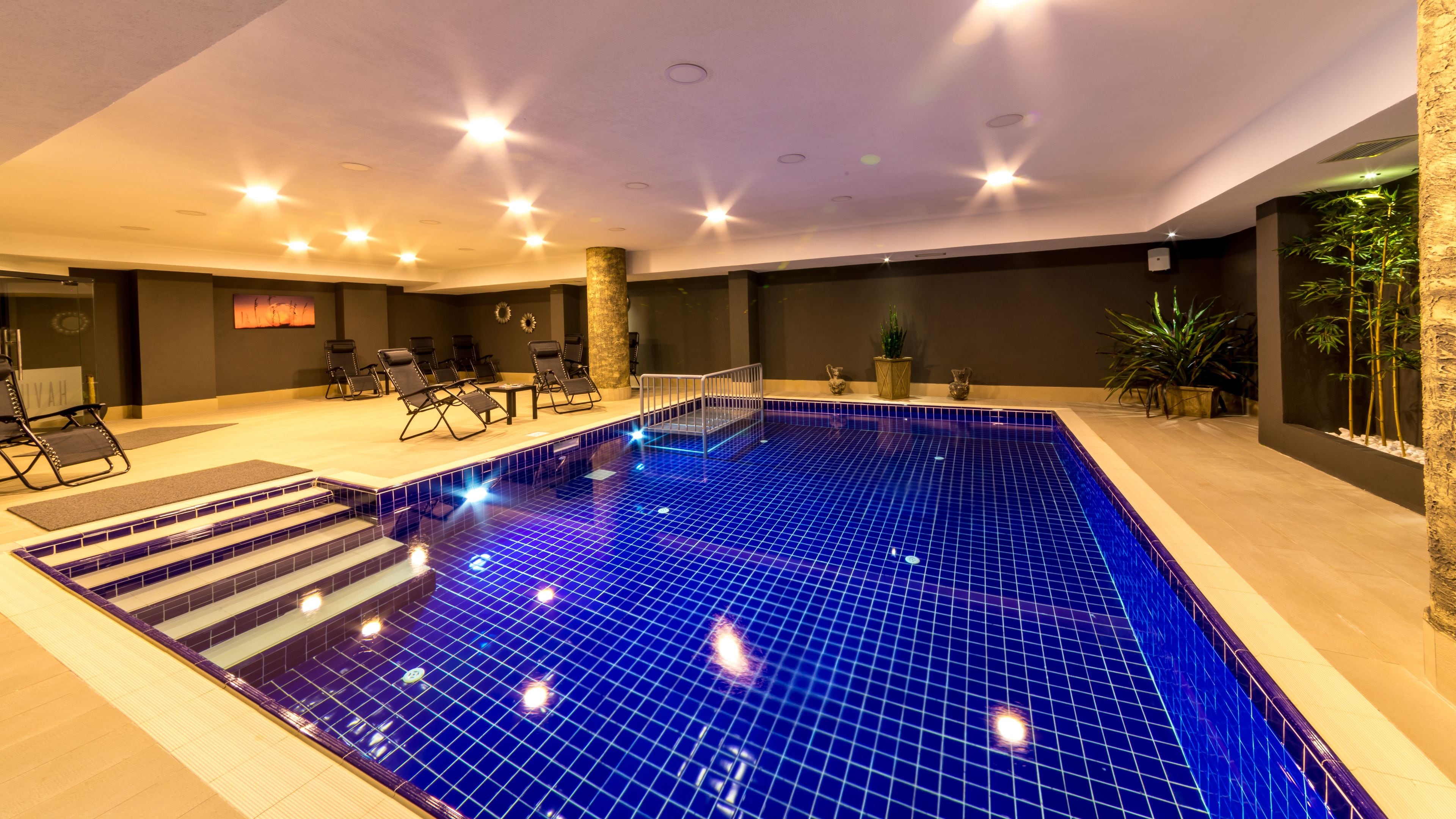 indoor pool, seasonal outdoor pool, pool loungers