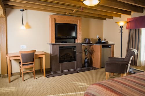 Chambre Signature, 1 très grand lit | Literie de qualité, bureau, rideaux d’obscurcissement