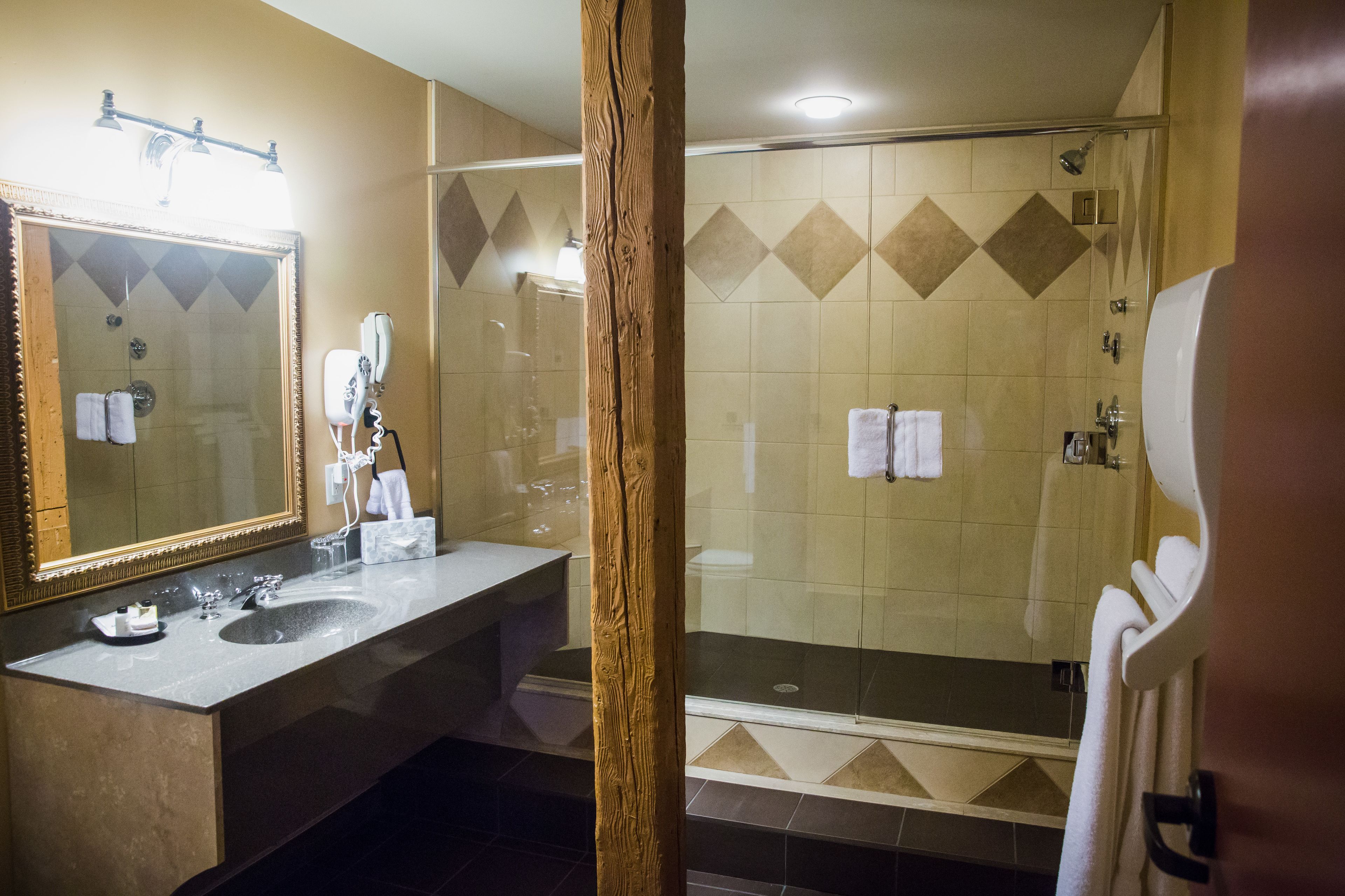 signature room, 1 king bed | bathroom sink