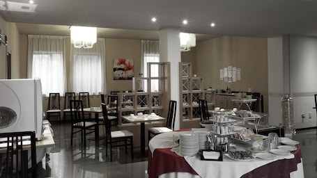 Daily buffet breakfast (EUR 8 per person)