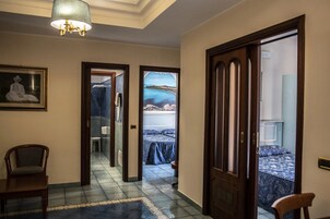 Apartment, Balcony, Garden View | Living area | 23-inch LCD TV with digital channels