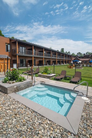 Seasonal outdoor pool, open 8:00 AM to 10:00 PM, pool umbrellas