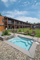 Seasonal outdoor pool, open 8:00 AM to 10:00 PM, pool umbrellas