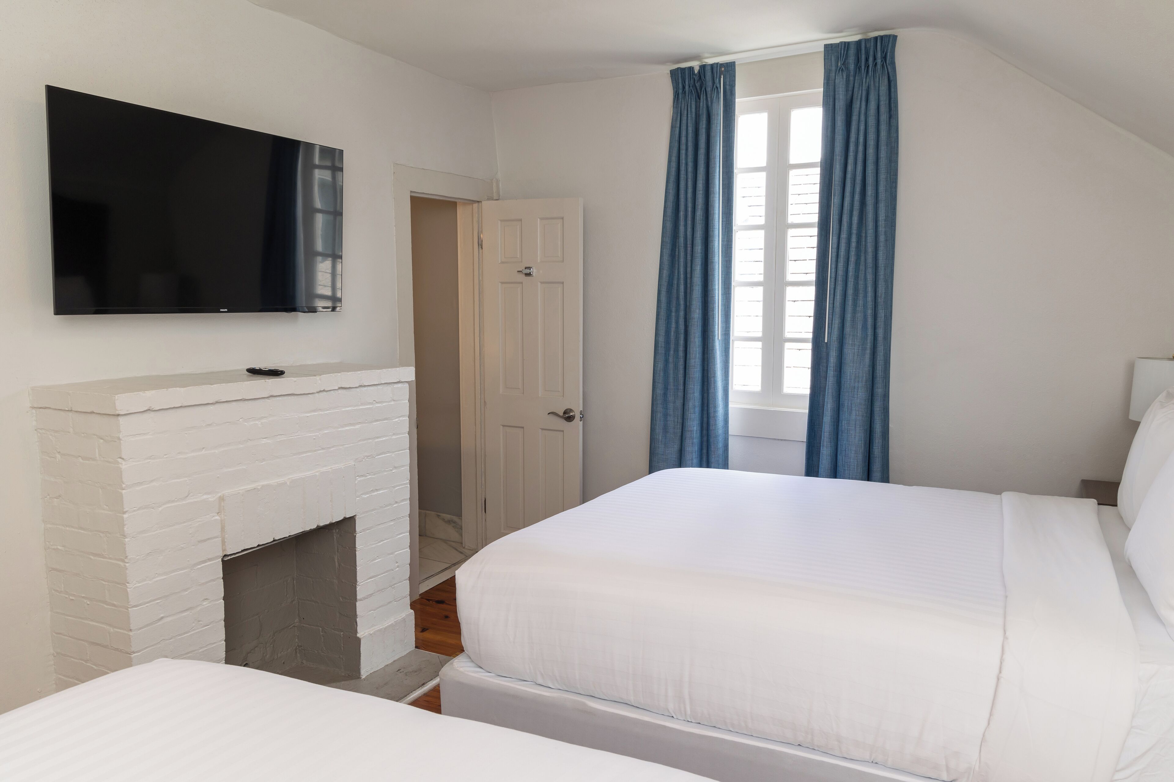 deluxe room, 2 queen beds | premium bedding, down duvets, pillow-top beds, individually decorated