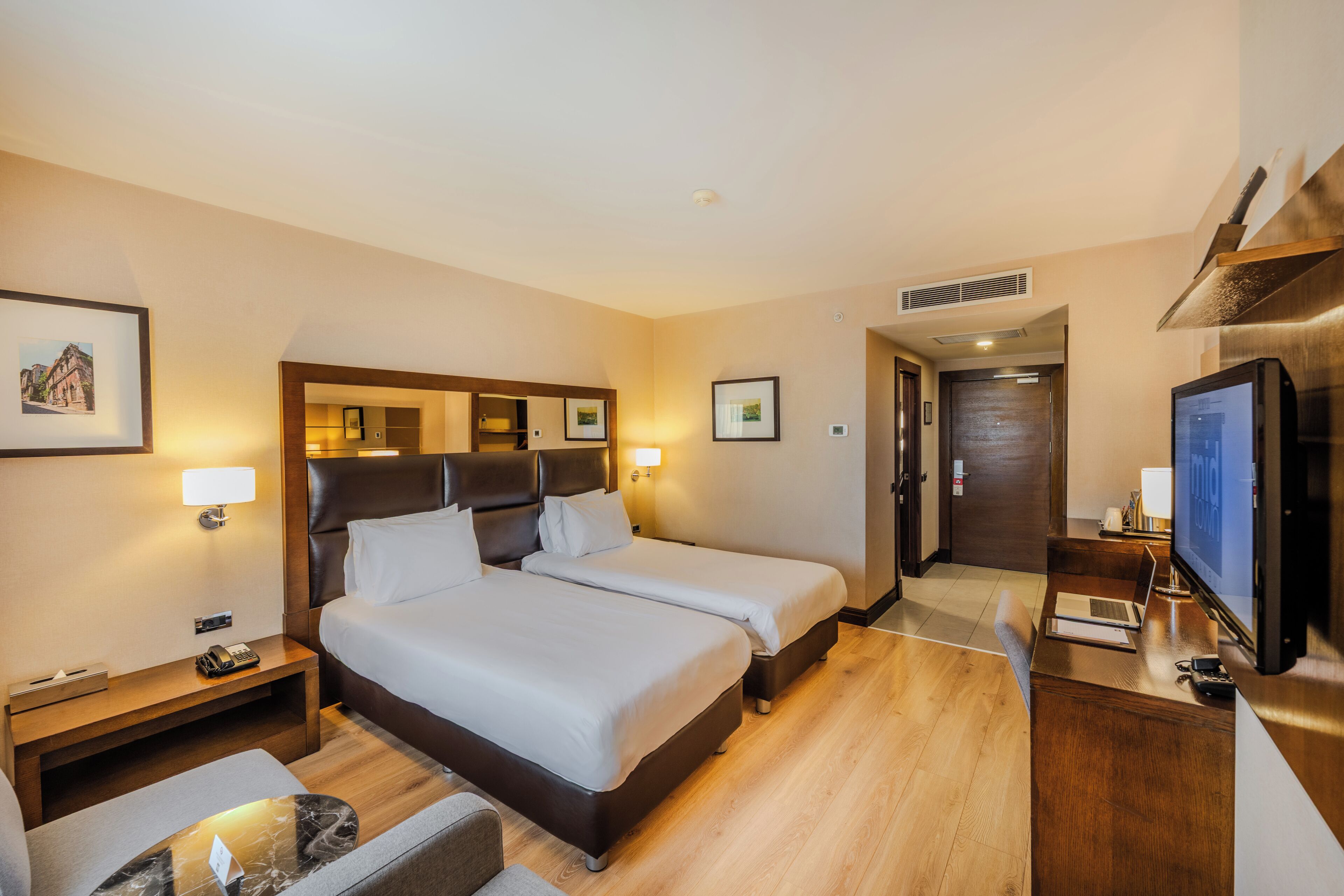 Premium bedding, memory-foam beds, minibar, in-room safe