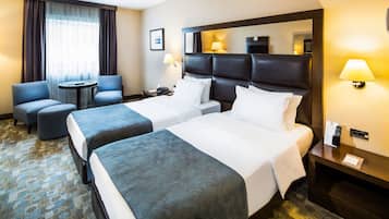 Premium bedding, memory foam beds, minibar, in-room safe