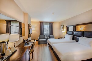 Ropa de cama de alta calidad, colchones con efecto memoria y minibar 