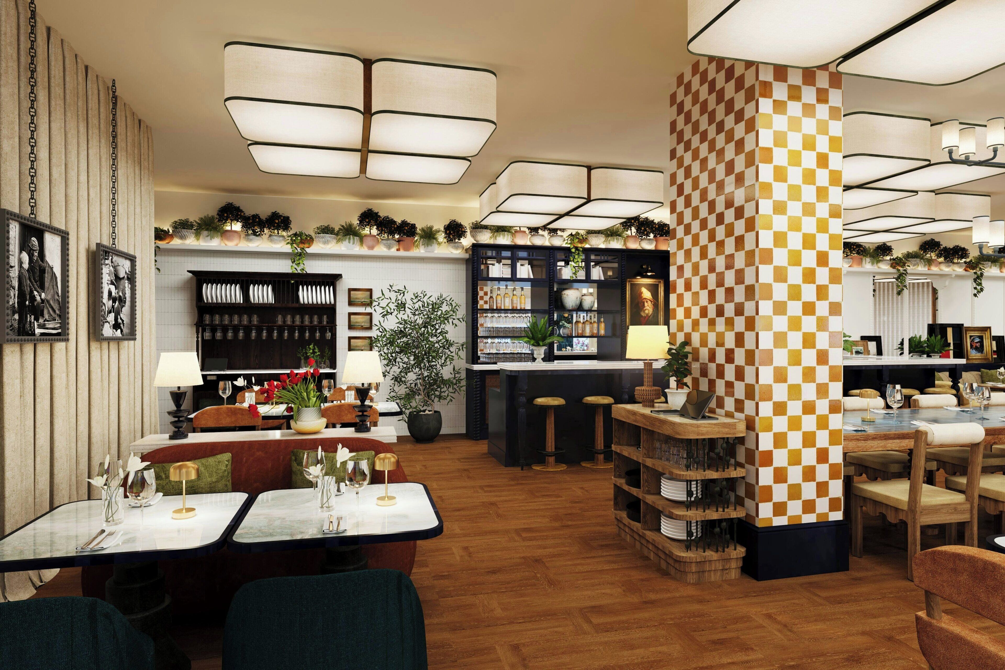 Un interior de restaurante con varias mesas, sillas y una zona de bar.