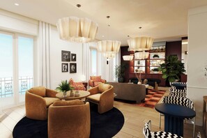 A modern living room with a sofa set, a coffee table, and a dining area with chairs. There are large windows and a view of the outdoors. - Jadran, Rijeka, a Tribute Portfolio Hotel (Rijeka)