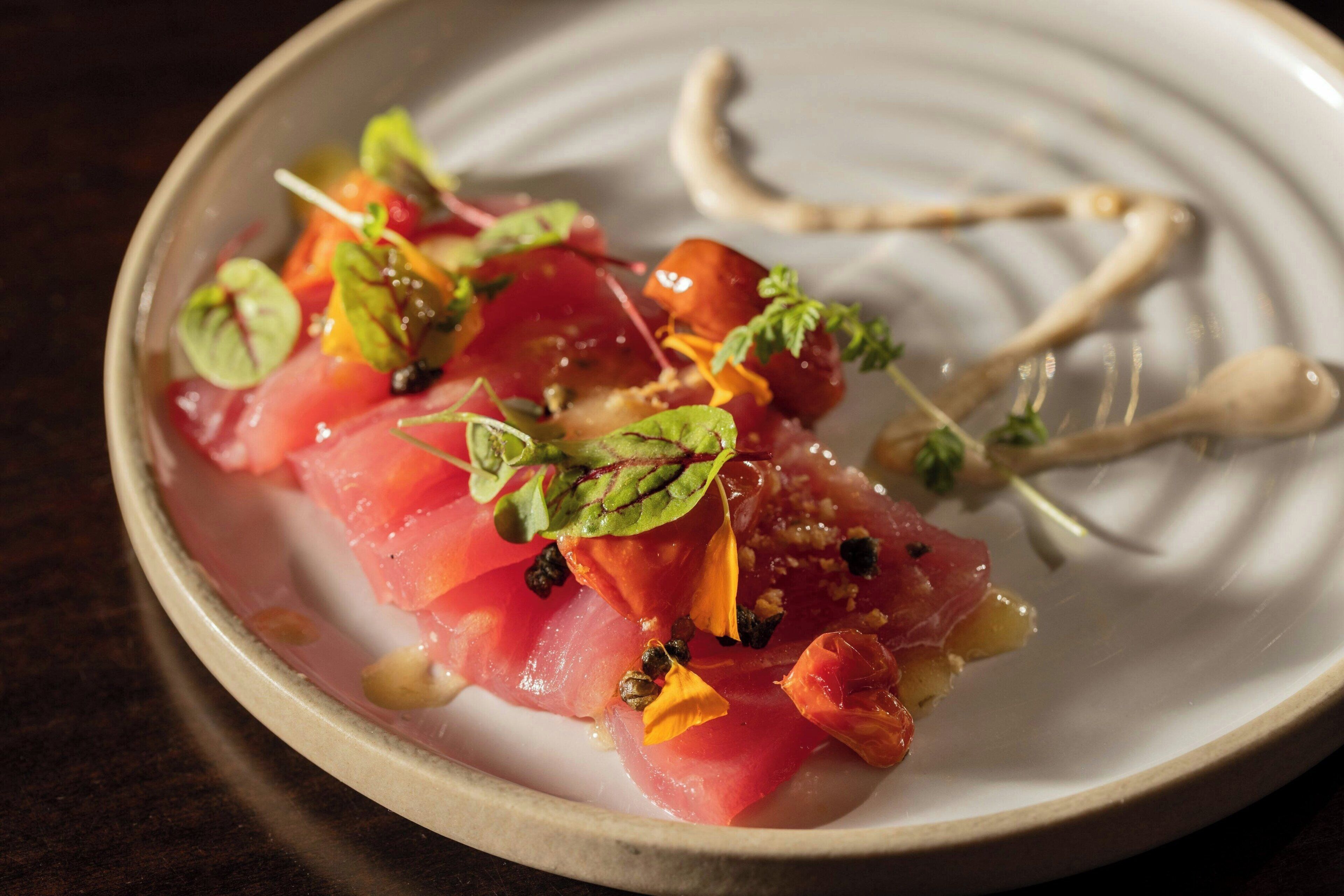 A dish with various ingredients on a plate.