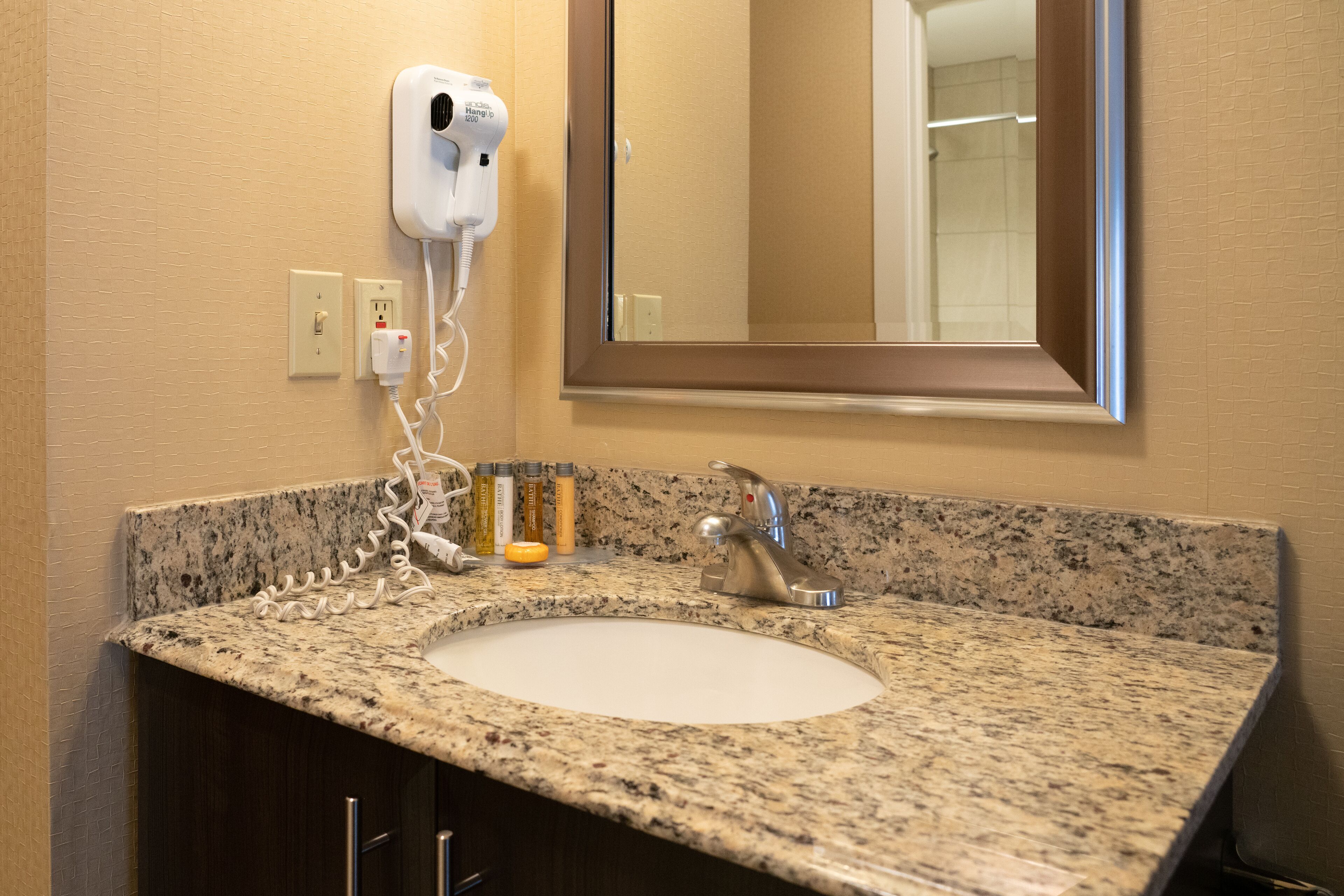 standard room, 2 queen beds | bathroom | eco-friendly toiletries, hair dryer, towels