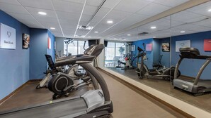 A gym with treadmills, stationary bikes, and exercise equipment. - Comfort Suites Seaford (Seaford)