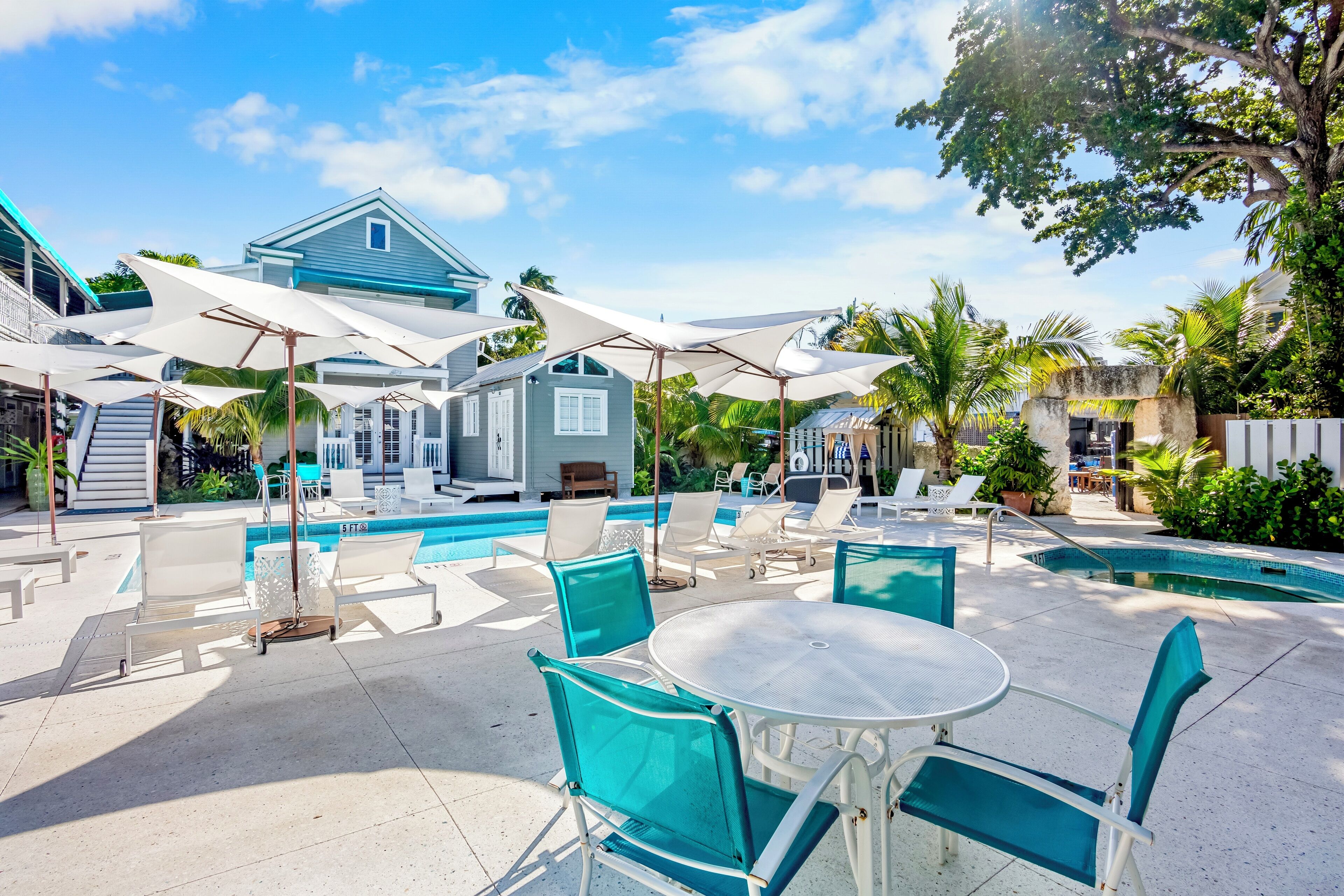 outdoor pool, pool umbrellas, pool loungers