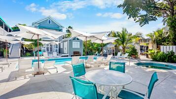 Outdoor pool, pool umbrellas, sun loungers