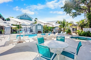 Outdoor pool, pool umbrellas, sun loungers