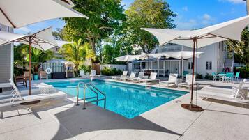Outdoor pool, pool umbrellas, sun loungers