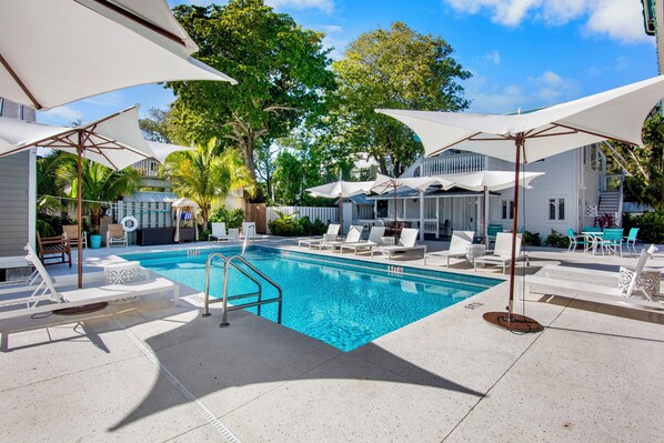 Outdoor pool, pool umbrellas, sun loungers