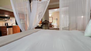 1 bedroom, premium bedding, blackout curtains, iron/ironing board