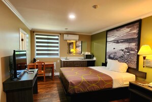 Room, 2 Queen Beds, Non Smoking (Efficiency) | Desk, iron/ironing board, bed sheets, alarm clocks