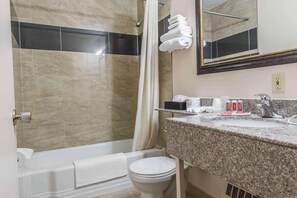 Suite, 1 King Bed, Non Smoking | Bathroom | Combined shower/tub, hair dryer, towels