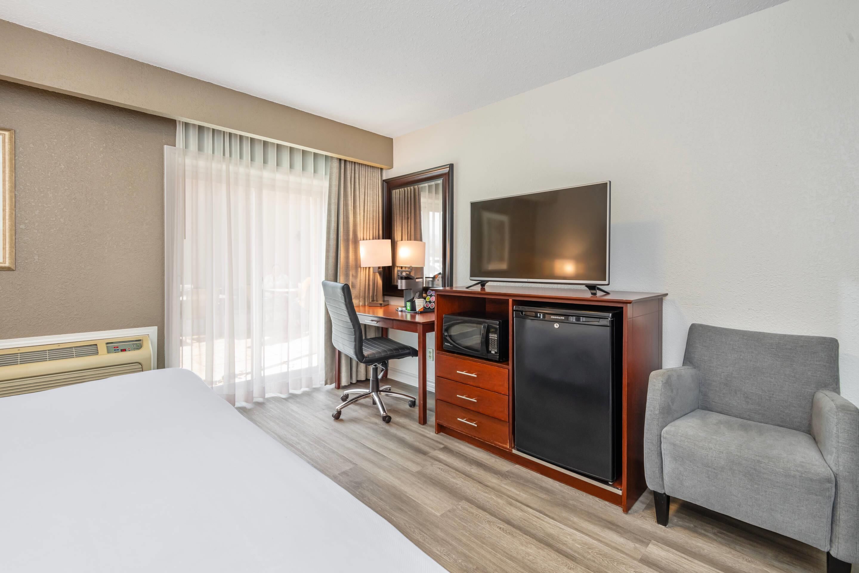 1 King Bed, Walkout Door | Blackout curtains, iron/ironing board, free WiFi, bed sheets