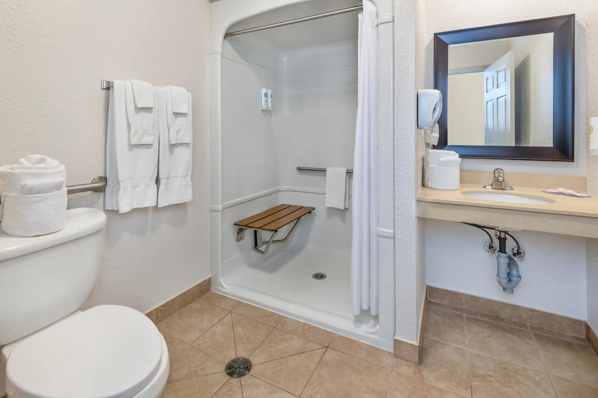 2 queen beds | blackout curtains, iron/ironing board, free wifi, bed sheets