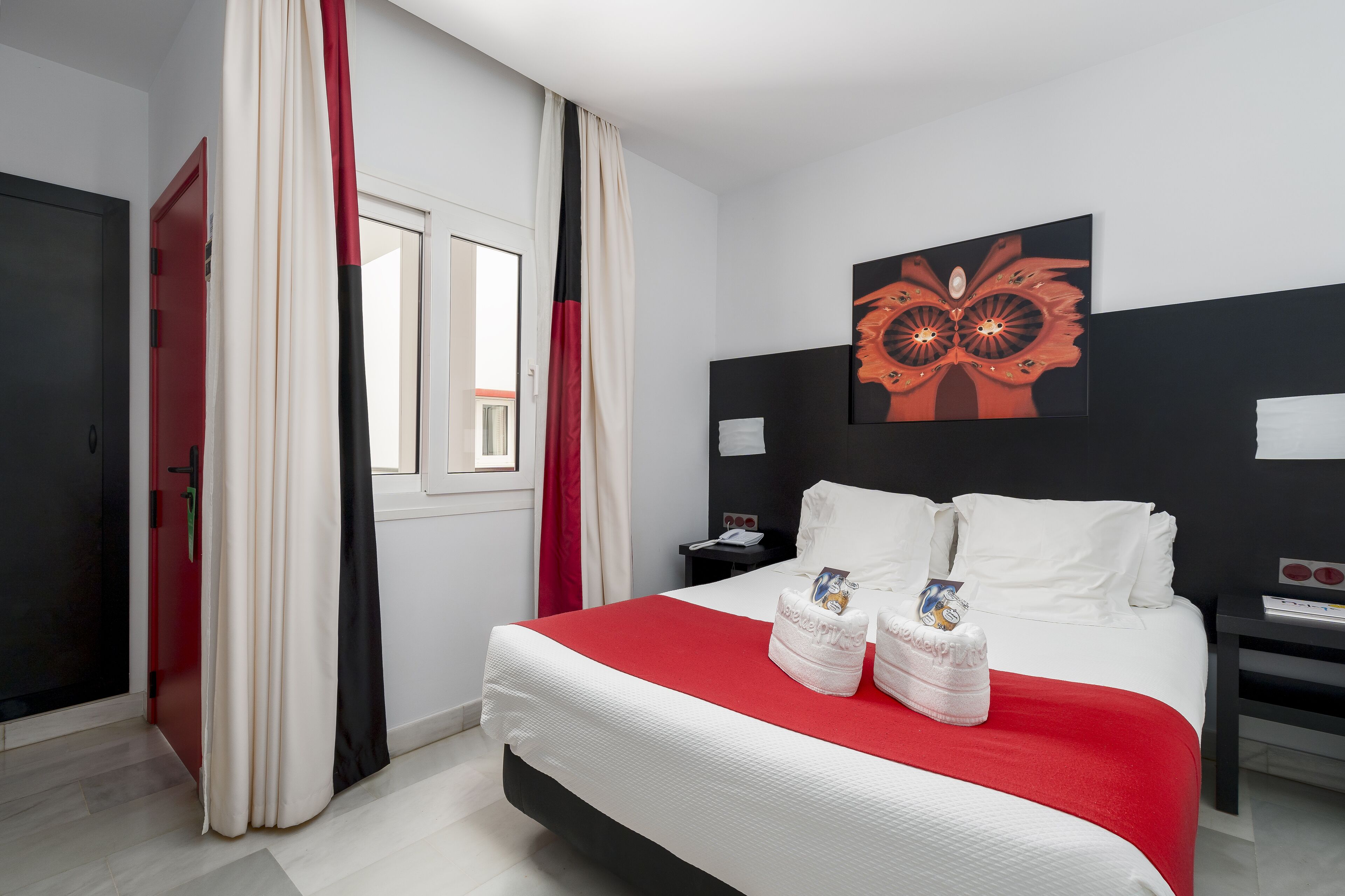 economy double room, 1 double bed, courtyard view | premium bedding, in-room safe, individually decorated, desk