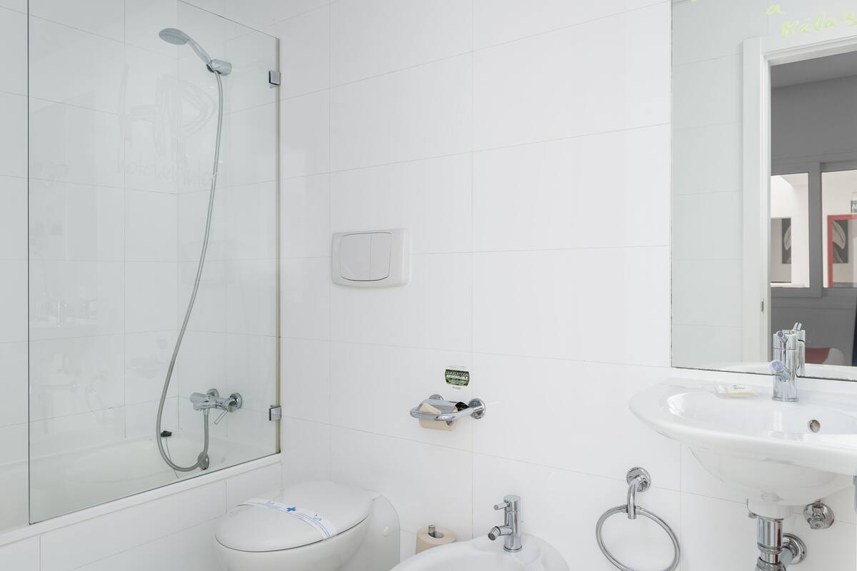 eco-friendly toiletries, hair dryer, towels