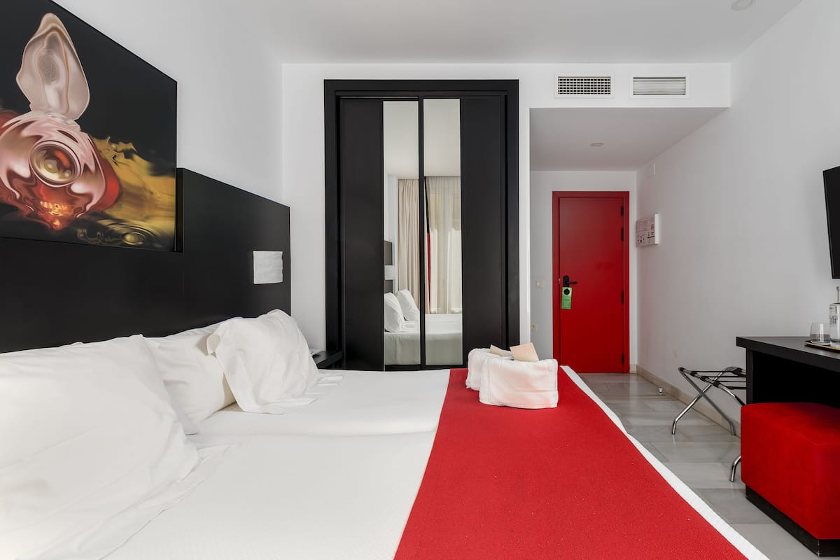 deluxe twin room | premium bedding, in-room safe, individually decorated, desk