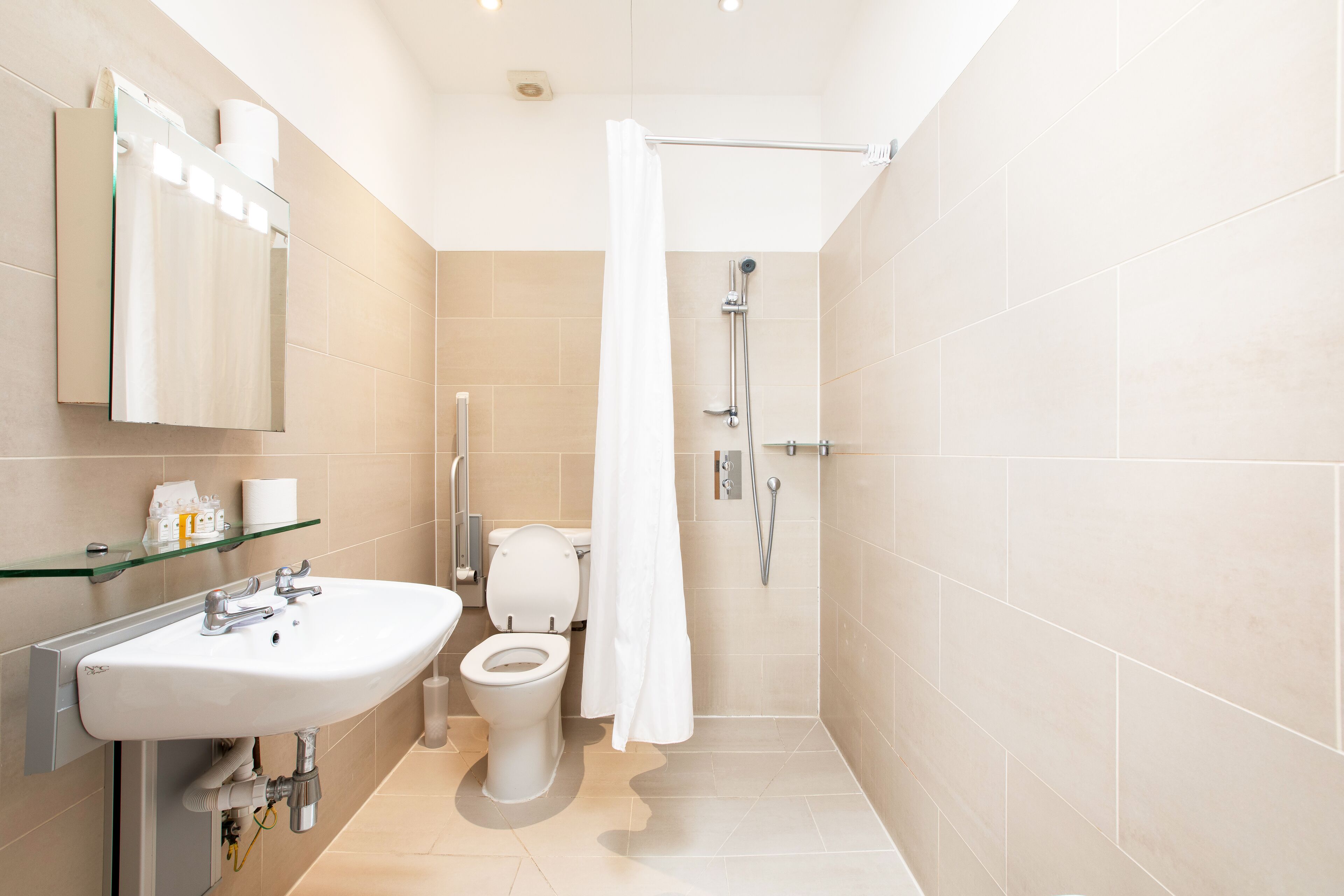 shower, free toiletries, hair dryer, towels