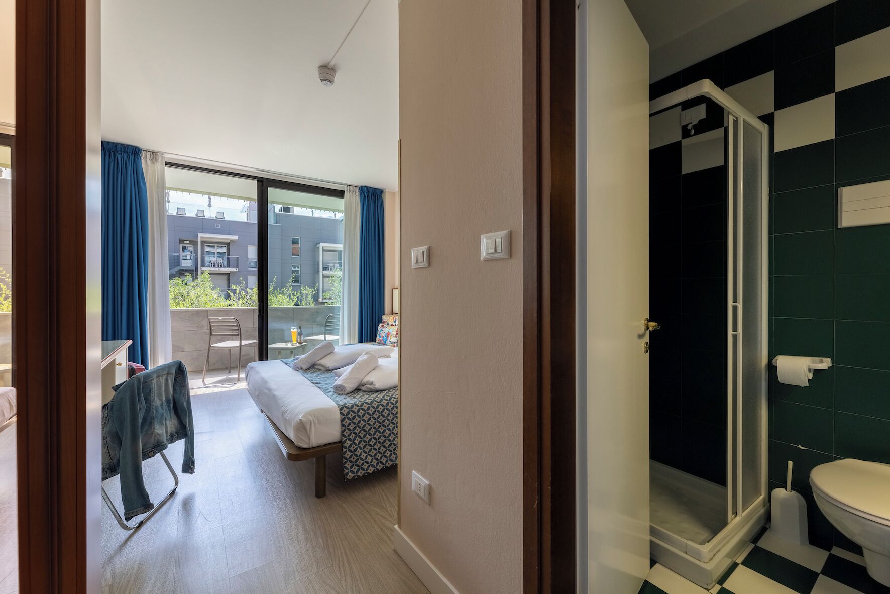 comfort room, garden area | 1 bedroom, in-room safe, desk, blackout curtains