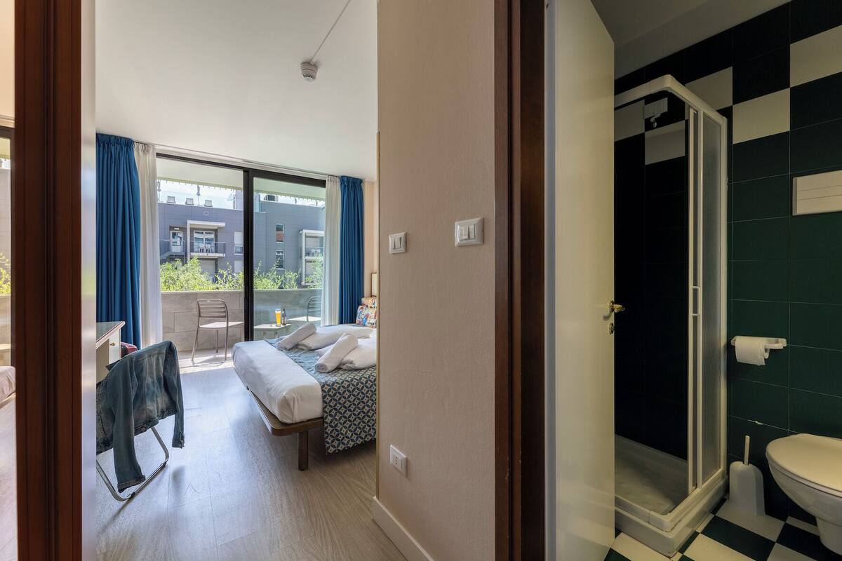 comfort room, garden area | 1 bedroom, in-room safe, desk, blackout curtains