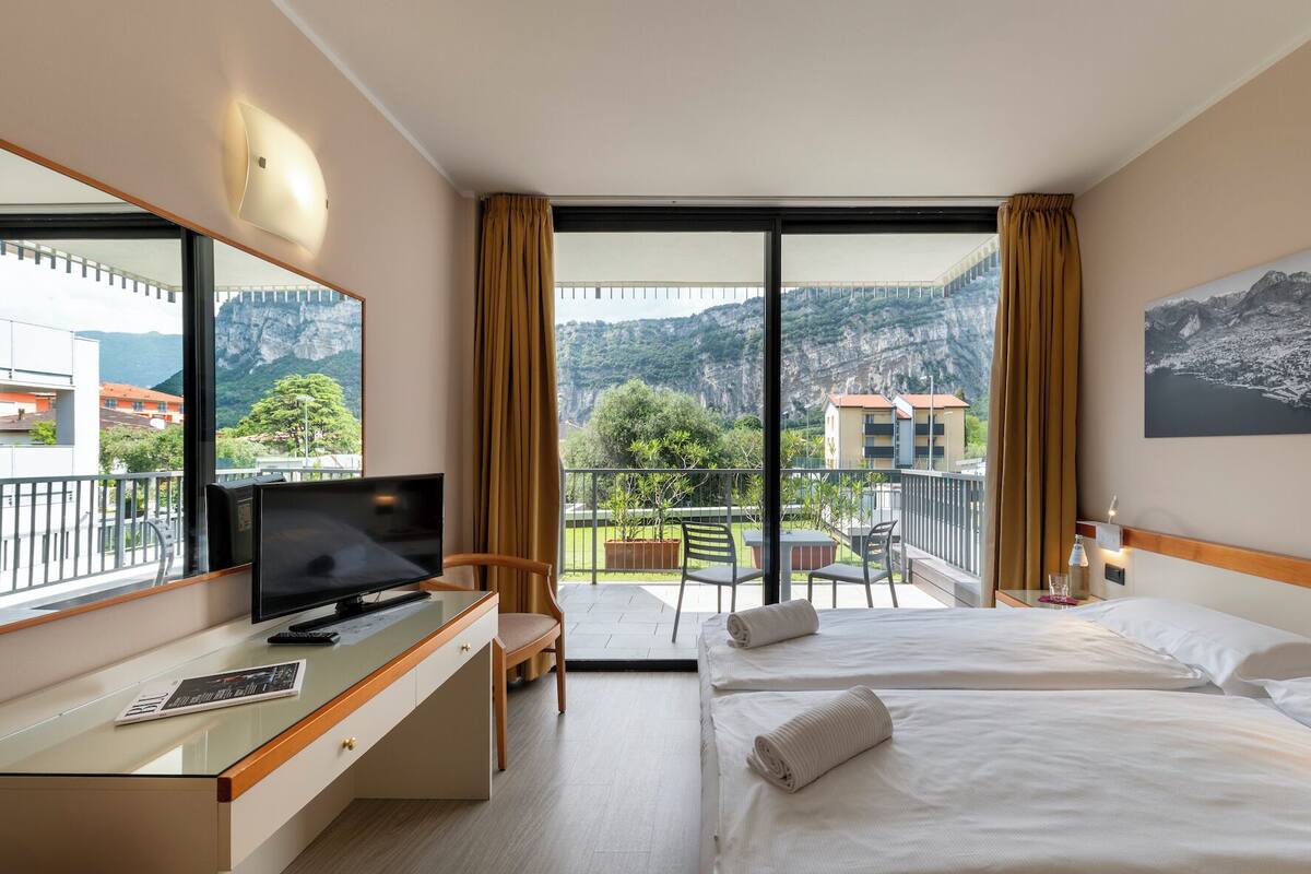 economy room, mountain view | 1 bedroom, in-room safe, desk, blackout curtains