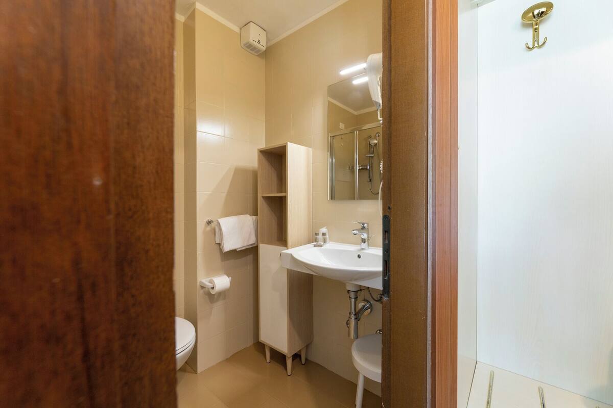 comfort room, balcony, pool view | bathroom | shower, free toiletries, hair dryer, bidet