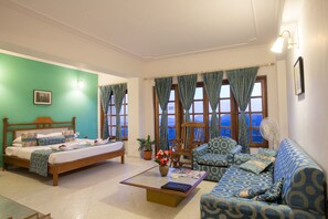 Royal Studio With Balcony and Valley View | Living area | 22-inch LCD TV with satellite channels, TV - Toshali Royal View Resort (Shimla)