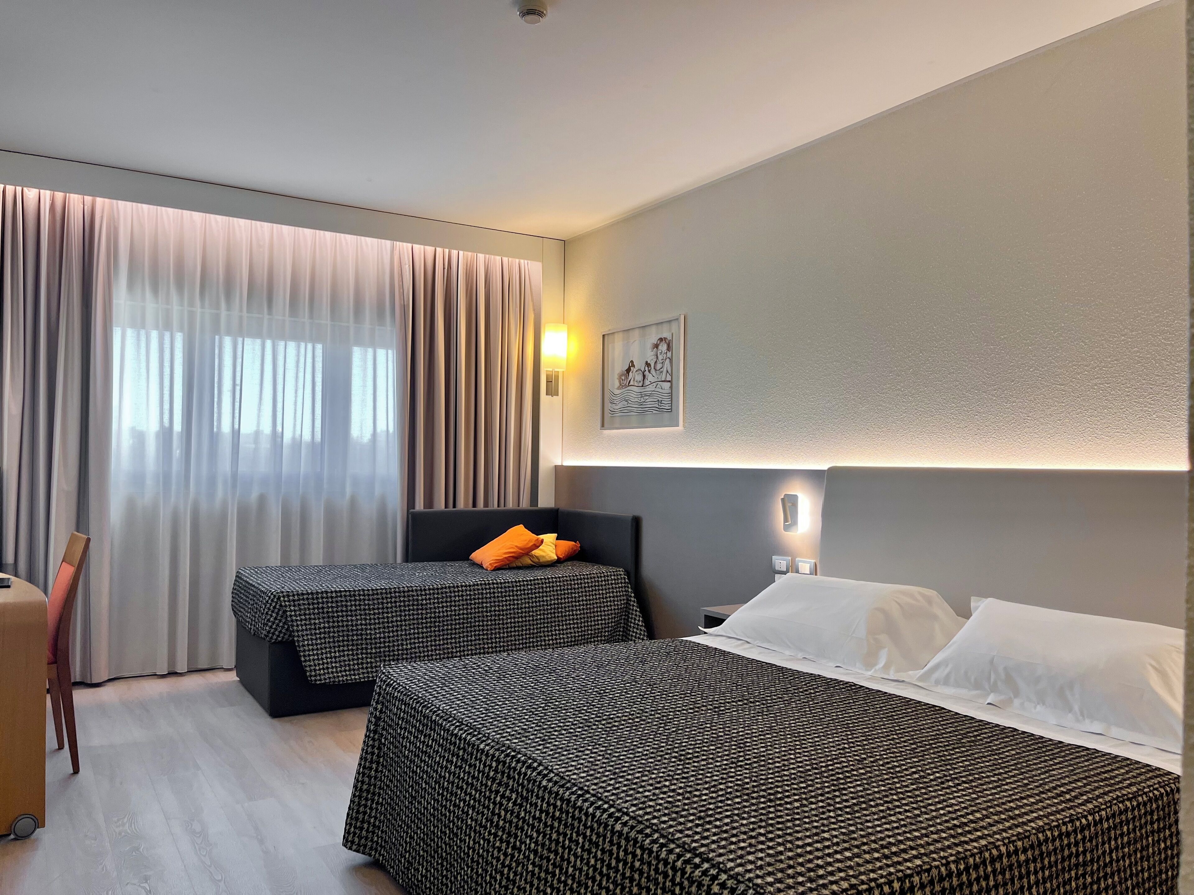 Down duvets, minibar, in-room safe, desk