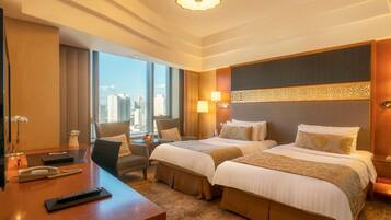 Chambre Deluxe, 2 lits une place | Literie de qualité supérieure, minibar, coffres-forts dans les chambres