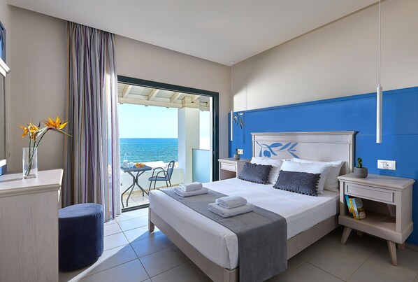 Suite, 1 Bedroom, Sea View | 1 bedroom, in-room safe, desk, soundproofing