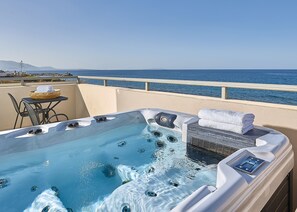 Suite, 1 Bedroom, Sea View (Open Air Jetted Tub) | 1 bedroom, in-room safe, desk, soundproofing