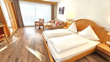 Comfort Quadruple Room, Balcony, Mountain View | Minibar, in-room safe, blackout drapes, soundproofing