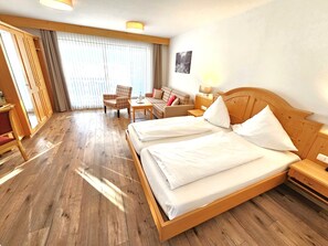 Comfort Quadruple Room, Balcony, Mountain View | Minibar, in-room safe, blackout curtains, soundproofing