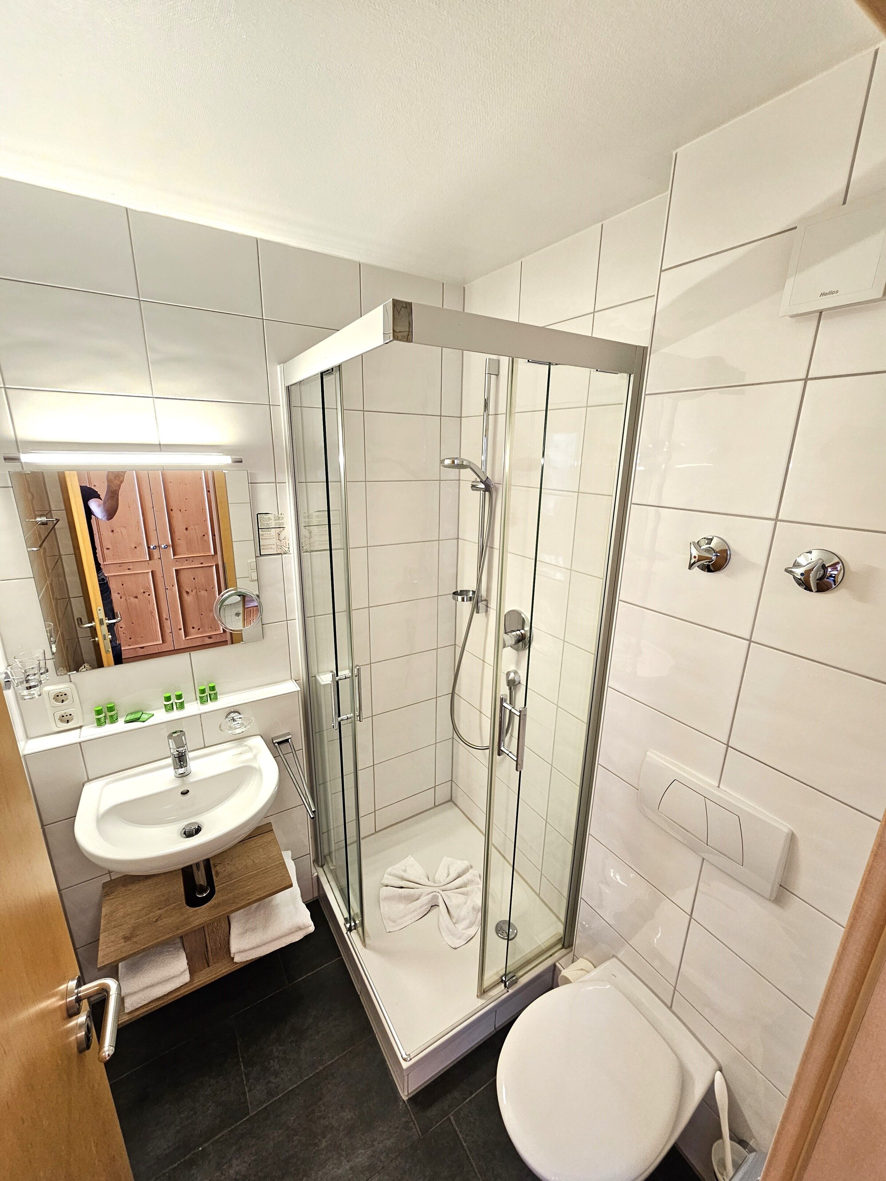 shower, hair dryer, bathrobes, towels